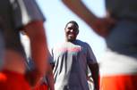 Bishop Gorman High School lineman, and UNLV recruit, Ron Scoggins, laughs with his teammates during practice Tuesday, July 12, 2011.